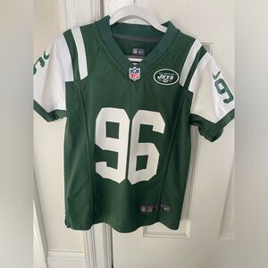Boys size Small New York Jets Wilkerson throwback jersey.